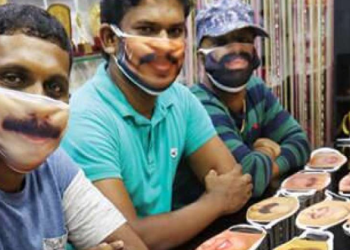 Marketing Level: Photographer Goes Viral For Selling Customised Masks With Faces