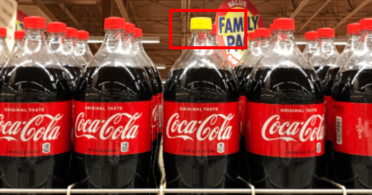 Here's Why Some Coca Cola Bottles Have A Yellow Cap