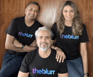 AI Helps Us Remove Friction That’s Been Eating Into Creativity For Years: Theblurr’s Shamsuddin Jasani Theblurr, Shamsuddin Jasani, Aatsi Desai Jasani, Gopa Kumar Menon, HumAIne, AI-native agency, AI-native marketing, full-service marketing solutions, Marketing Mind interview, media-aware ideas, silo-free model, creative and media integration, AI and creativity, outcome-led agency, integrated marketing