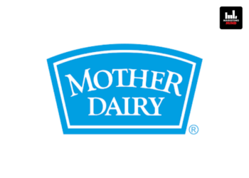 Mother Dairy is targeting a 20% increase in revenue to over Rs 24,000 crore in FY27, backed by rising consumer demand and plans to expand into new markets, according to media reports. As per media reports, the dairy major recorded a turnover of Rs 20,300 crore in FY26, up 17% year-on-year. The company has more than doubled its revenue over the last five years, crossing the Rs 20,000-crore milestone. As part of its growth strategy, Mother Dairy is looking to strengthen its presence outside Delhi-NCR. Chairman Meenesh Shah said the company is exploring entry into new markets where it currently has limited or no presence. The company is also setting up a dairy plant in Maharashtra, has leased a facility in Hyderabad, and is establishing a second plant in Bihar. Managing Director Jayateertha Chary said sales in the first two months of the fiscal have been encouraging, with ice cream emerging as a strong-performing category. Reports also suggest that from Mother Dairy’s FY26 turnover, the dairy business contributed more than Rs 15,000 crore, while edible oils and horticulture accounted for around Rs 5,000 crore. Around 63% of revenue came from Delhi-NCR, with the remainder generated from other parts of the country. The company currently reaches more than 95 cities across India and operates nine milk processing plants, four horticulture processing plants and 16 associated edible oil facilities.